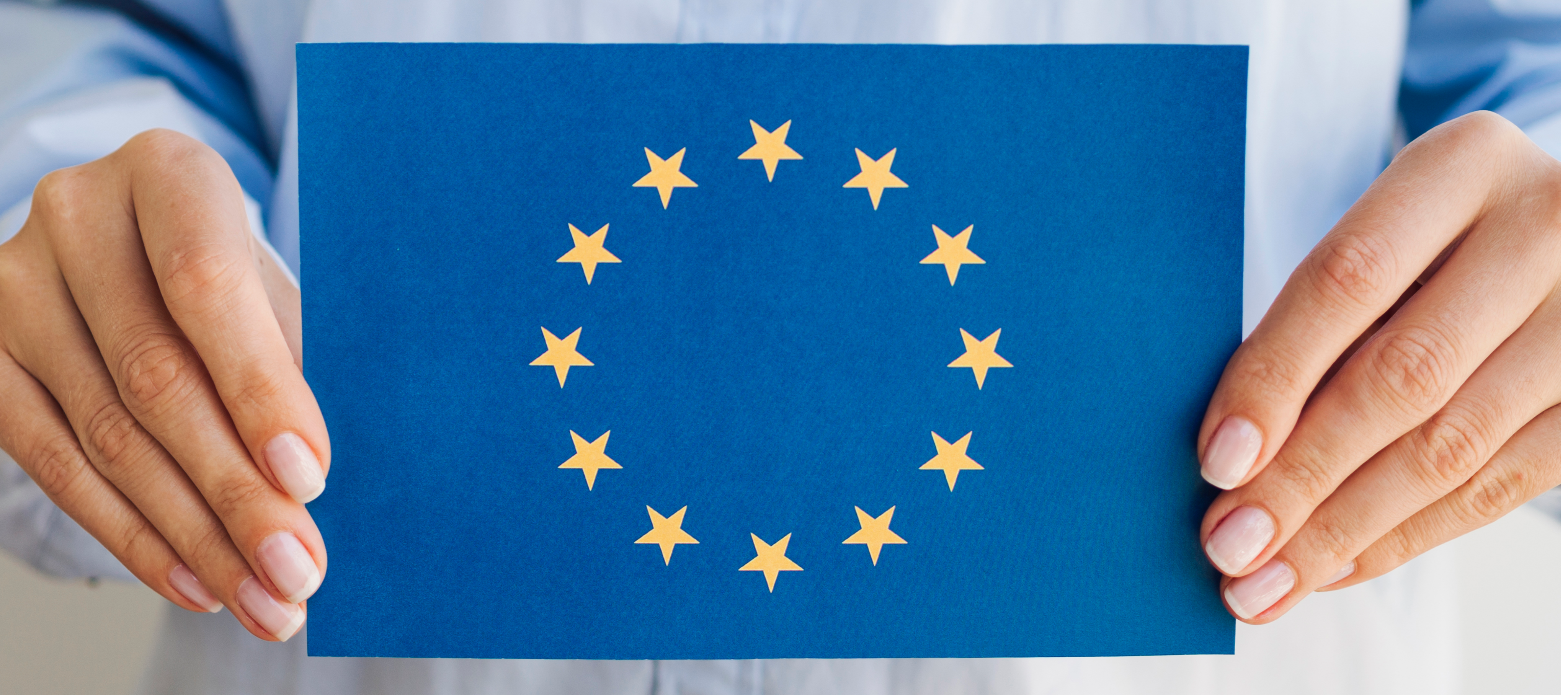 woman-holding-european-union-envelope 1